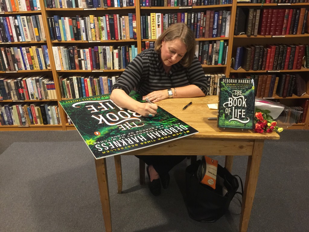 Deborah graciously signing the HUGE TBOL poster 